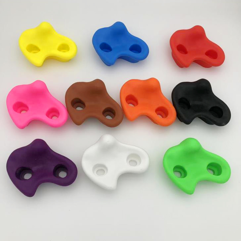 kids outdoor playground rock climbing holds